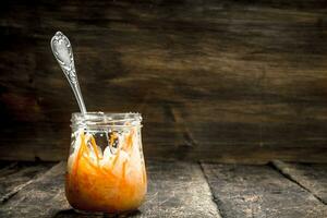 Marinated cabbage in glass jar. photo