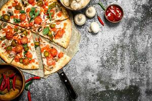 Mexican pizza with hot peppers. photo