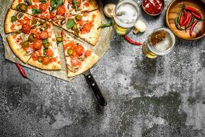 Mexican pizza with cold beer. photo