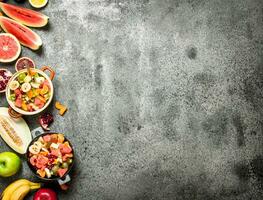 Tropical food . Fresh tropical fruit salad in bowls. photo