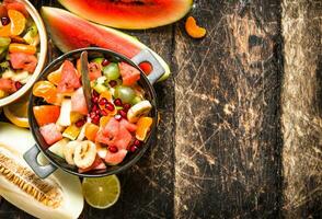 Summer food . Salad of tropical fruits. photo