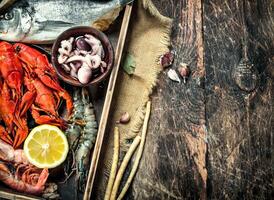 Seafood in an old tray. photo