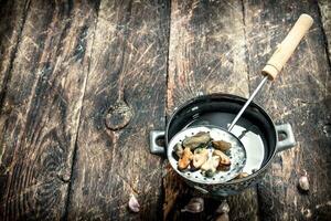 Boiled mussels in a bowl. photo