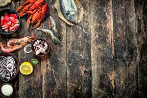 Different seafood in bowls. photo