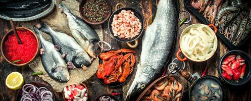 Different seafood with shrimps and red caviar. photo