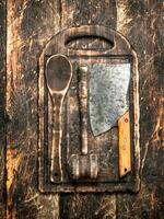 Serving background. Old kitchen tools cutting Board. photo