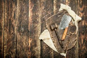 Serving background. Old kitchen tools cutting Board. photo