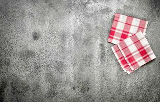 Serving background. Textile napkins. On rustic background. photo