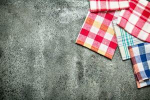 Serving background. Textile napkins. On rustic background. photo