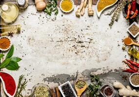 Different spices, herbs and roots view from the top. photo