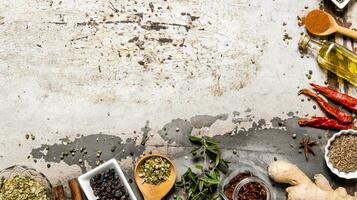 Different spices, herbs and roots view from the top. photo