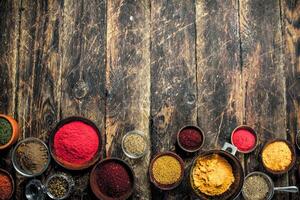 Various ground spices and herbs. photo