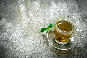 Green tea in a glass cup. photo