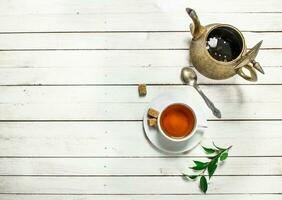 Mug with black tea. photo