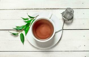 Mug with black tea. photo