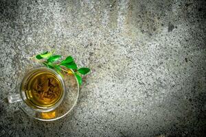 Green tea in a glass cup. photo