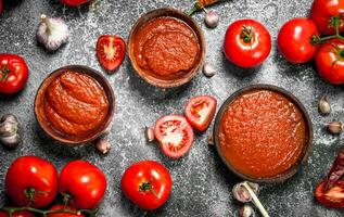 Tomato sauce with spices and herbs. photo