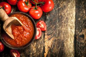 Tomato sauce in a bowl. photo
