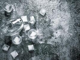 Vodka with ice in glasses. photo