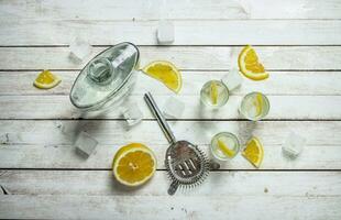Vodka shots with lemon and ice. photo