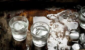 Vodka shots with ice photo