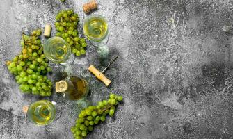 White wine from green fresh grapes. photo