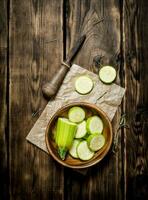 Sliced zucchini and an old knife photo