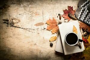 Autumn style. Coffee with an old books. photo