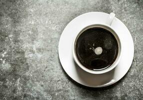 Fresh aromatic coffee in the Cup. photo