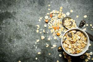 Fitness food. Cereals with dried fruit in the Cup. photo