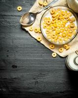 Cereal with milk in a glass dish. photo