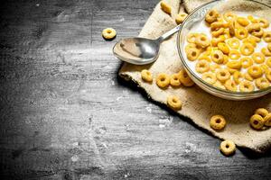 Cereal with milk in a glass dish. photo