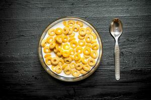 Cereal with milk in a glass dish. photo