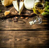Goat cheese with white wine and nuts. photo