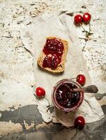 The sandwich with sour cherry jam. photo