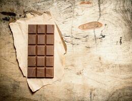 Bar of milk chocolate. photo