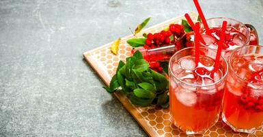 Cocktail with ice and ingredients on a stone tray .  Free space for text. photo