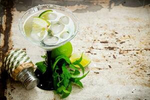 Fresh cocktail with ice . Free space for text. photo