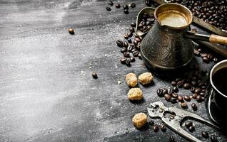 Brewed coffee pot with sugar photo