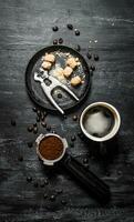 Fresh coffee . Coffee pot and dark cane sugar. photo