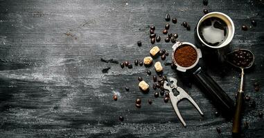 Fresh coffee. Coffee cup with brown sugar and roasted grains . photo