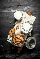 Oatmeal cookies with fresh milk. photo