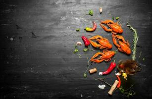 Boiled crawfish with white wine and spices. photo