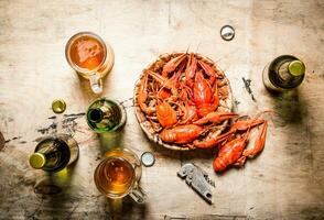 Fresh boiled crawfish with beer. photo