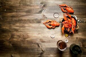 Fresh boiled crawfish with beer. photo