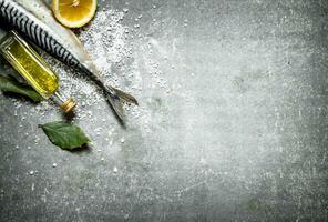 Raw fish with olive oil, lemon and salt. photo