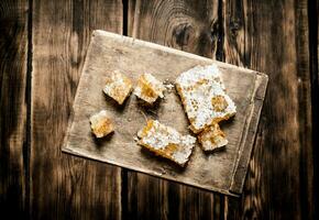 Slices of natural honey in the comb photo