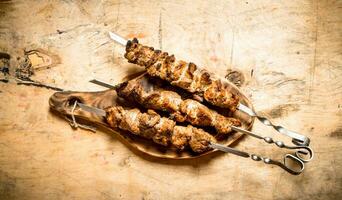 Shish kebab On skewers. photo