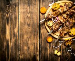 Shish kebab with grilled vegetables. photo