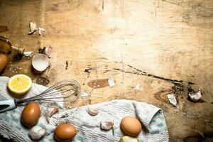 Making mayonnaise from eggs, garlic and lemon. photo